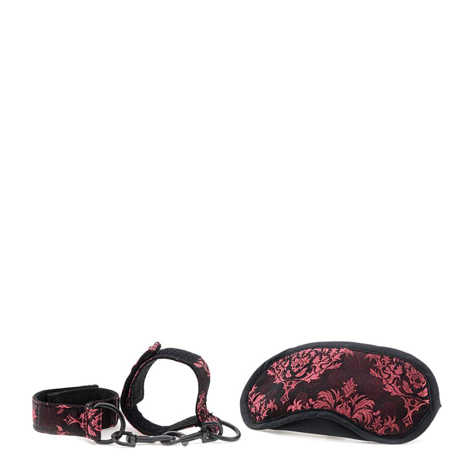 Czarno-czerwony zestaw niewoli z obrożą, smyczą, zaciskami i kajdankami