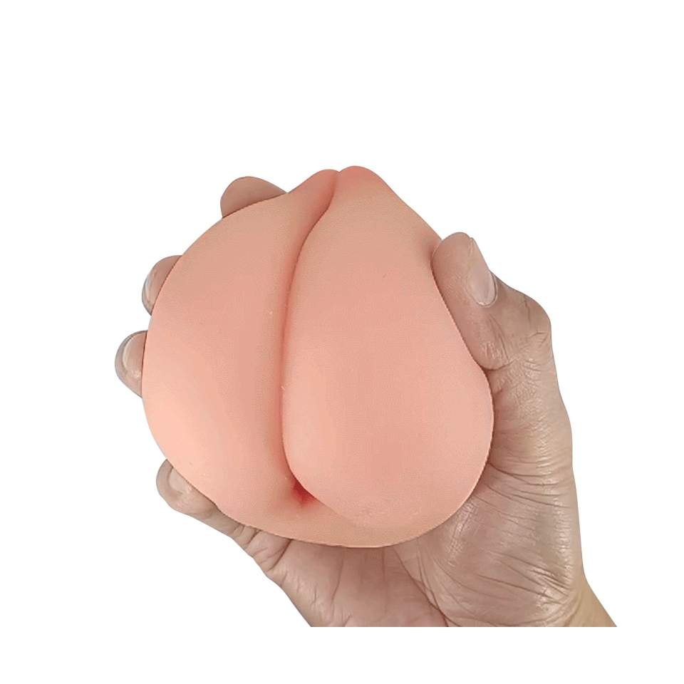 Atrakcyjny masturbator w cielistym kolorze - kształtem przypominający miniaturowy tyłeczek i pierś
