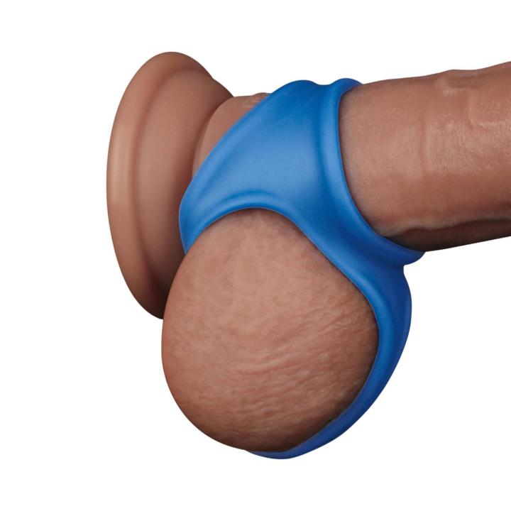 Pierścień erekcyjny wykonany z silikonu- trzy otwory dla stymulacji członka i jąder