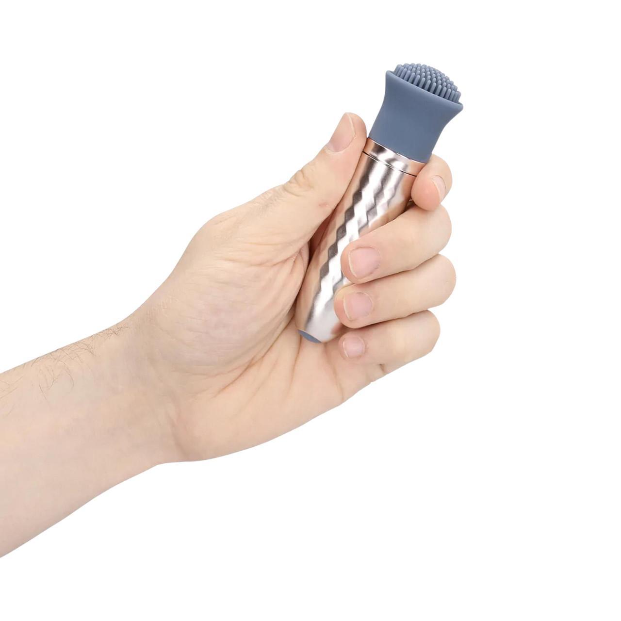 Elegancki mały masażer z wymiennymi końcówkami