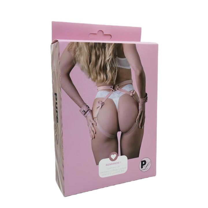 Różowa uprząż BDSM z opaskami na nadgarstki i kółkami | Loris.pl