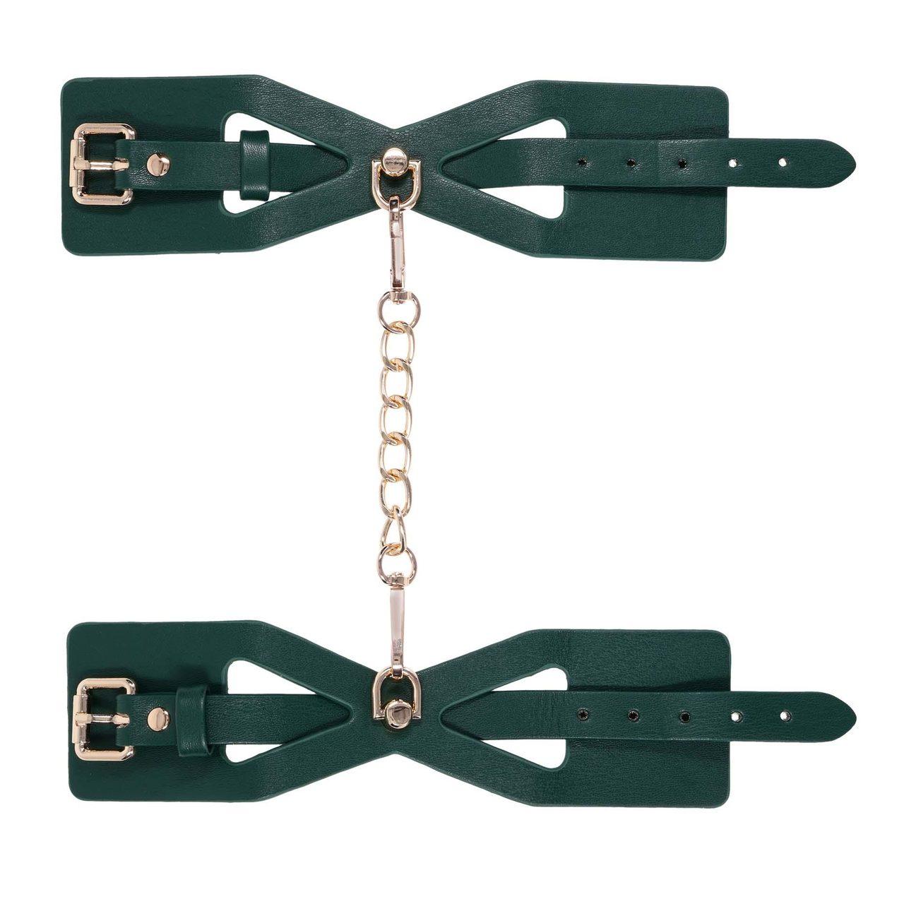 Szmaragdowe kajdanki BDSM z wycięciami i złotymi detalami | Loris.pl