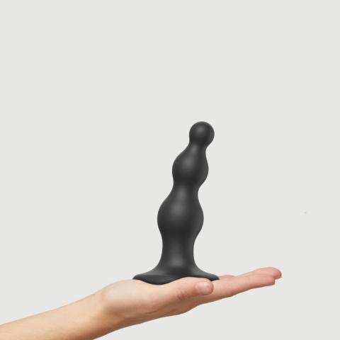 Czarne dildo analne z koralikami S z przyssawką