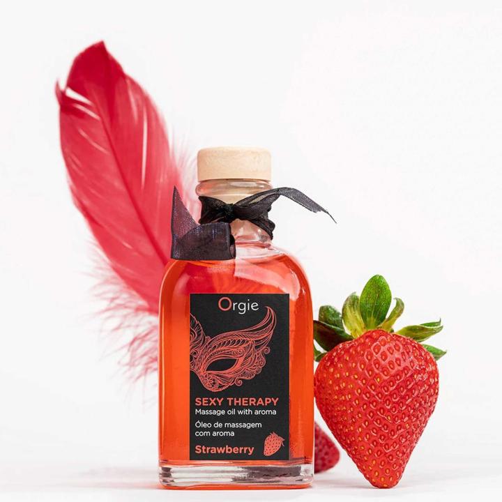 Truskawkowy zestaw do masażu warg 100 ml z piórkiem