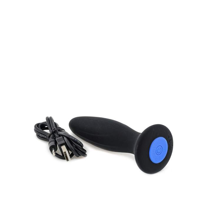 Czarny, silikonowy korek analny z dużym przyciskiem sterującym i ładowaniem przez kabel USB