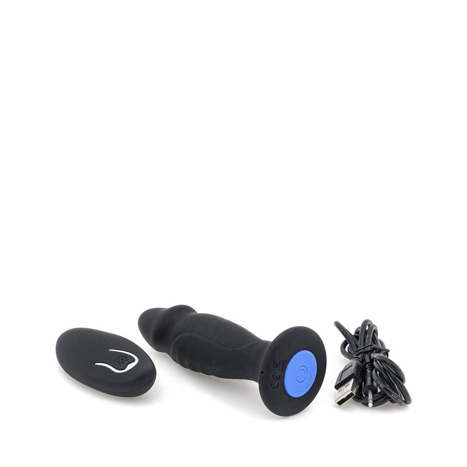 Czarny wibrujący korek analny w kształcie członka z pilotem bezprzewodowym na baterie