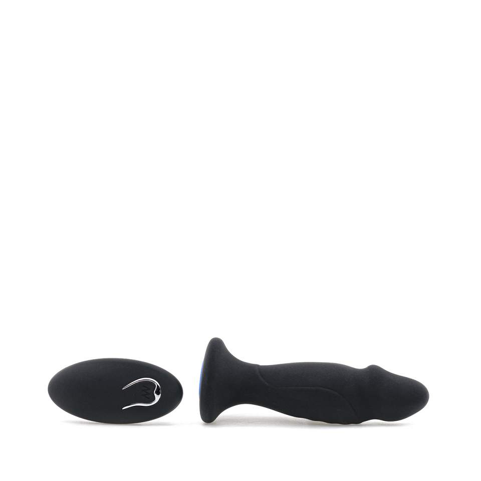 Czarny wibrujący korek analny w kształcie członka z pilotem bezprzewodowym na baterie