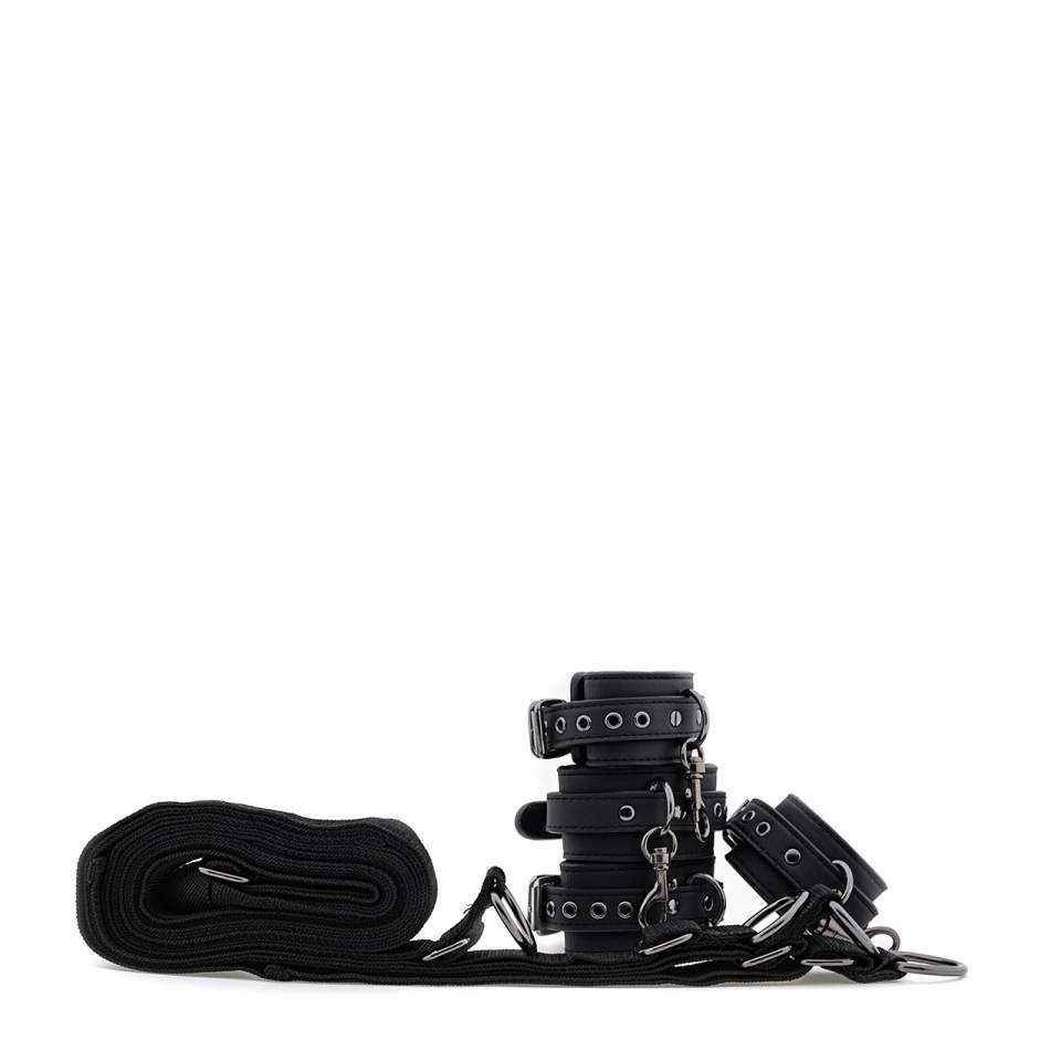 Czarny skórzany zestaw do krępowania pod materac 