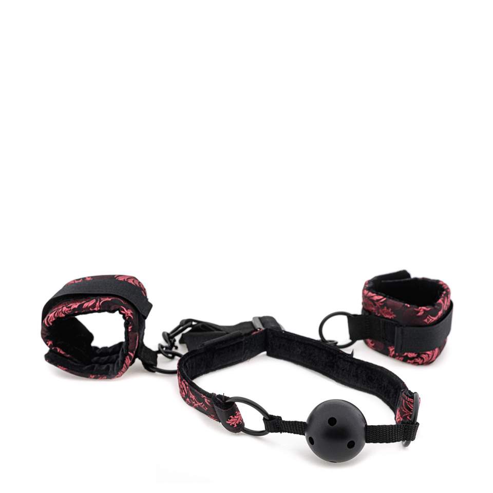 Elegancki czarno-czerwony zdobiony knebel z kajdankami